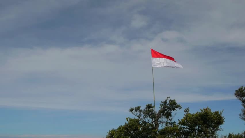 The charm of Mount Bromo in summer and the Indonesian flag at the location
located in East Java, Indonesia