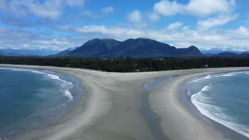 Beautiful drone shot of beach and mountains on Vancouver Island in Canada