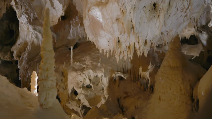 Frasassi Caves, rock formations inside the caves full of white calcite stalactites and stalagmites. Marche, Italy