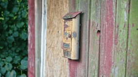 Old Fashioned Rusted Metal Mail Letter Box with Traditional Post Horn Symbol Emblem - Powered by Shutterstock - Get 15% off with code: PIKWIZARD15