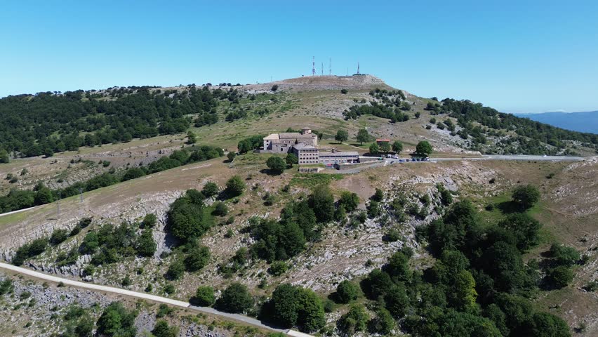 Flying over the sanctuary of San Miguel de Excelsis, nestled among the peaks of the Aralar mountain range
