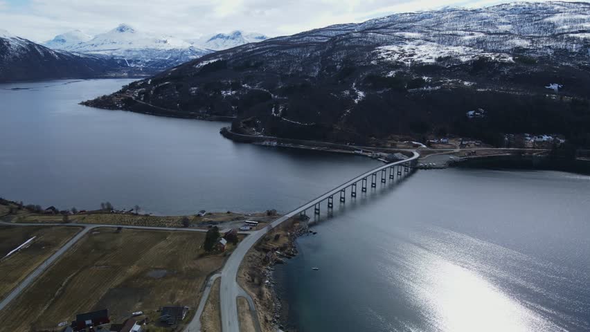 Arsteinbrua Bridge Across Gratangen Fjord In Gratangen, Troms of Finnmark, Norway. aerial shot