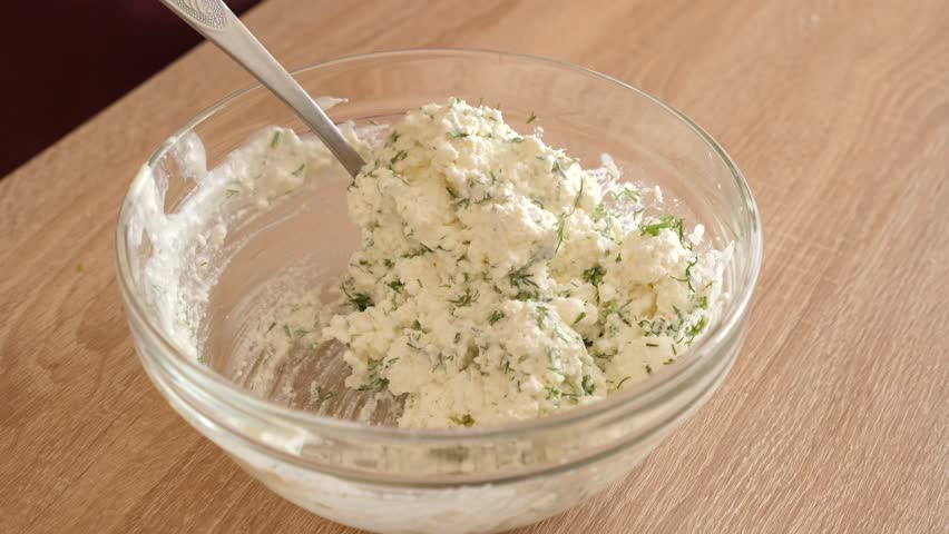 Add dill to the cheese and mix.