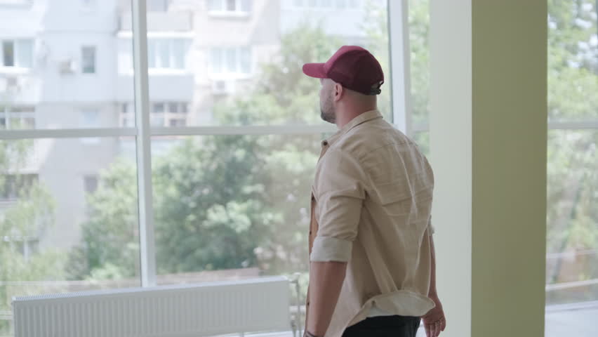 Stylish young man dancing break dance and choreography. Performance, movement, style and fashion concept