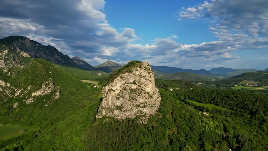 Panoramic mountain view near the village of Saou in the Drome department in France of the Vercors hills, the marly hills and the Val de Drome valley. The Saou forest and the 3 peaks - Drome Valley
