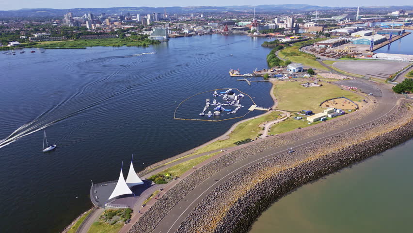 Aerial view of Cardiff Bay flying towards the city