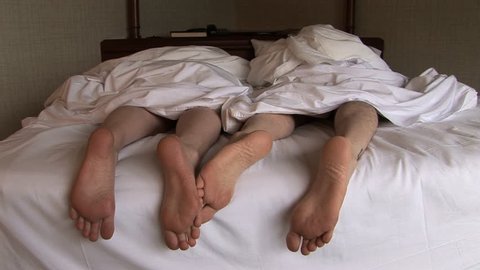 Grumpy Feet in Bed 