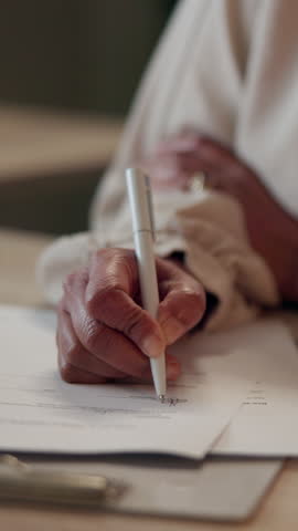 Hands, person and signature for contract in office to review information, legal compliance and process of agreement. Lawyer, reading and document with negotiation, policy rules and title deed details