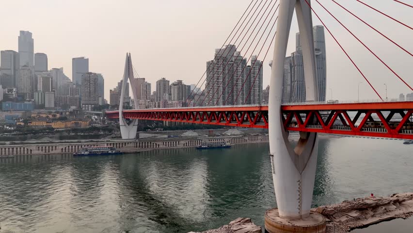 4K drone footage of Dongshuimen bridge over Yangtze River in Chongqing, China