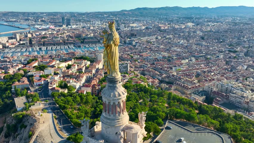 Notre-Dame de la Garde in Marseille aerial view, establishing shot of French town of Marseille, travel and tourism in France