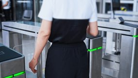 Woman holding mobile phone scanning enters checkpoint, slow motion video  - Powered by Shutterstock - Get 15% off with code: PIKWIZARD15