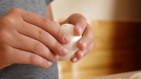 The shell is removed from the hard-boiled egg. Boiled egg as an ingredient for cooking. - Powered by Shutterstock - Get 15% off with code: PIKWIZARD15