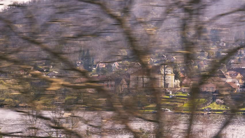 View of the Elbe river valley and mountains in Germany from a train in Kurort Rathen