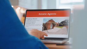 Person Viewing Estate Agents Properties on Laptop at Home - Powered by Shutterstock - Get 15% off with code: PIKWIZARD15
