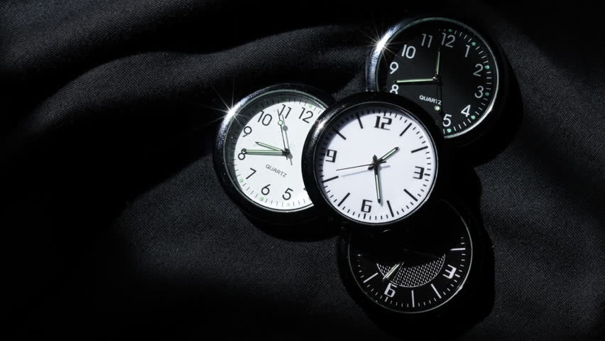 Close up Clock Face in Time Lapse. clock face time passing by. Time lapse on white Clock.