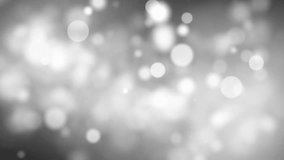 A dreamy soft-focus image featuring white bokeh lights against a gray background. This abstract composition is perfect for adding an ethereal touch to your designs. - Powered by Shutterstock - Get 15% off with code: PIKWIZARD15