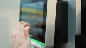 Person Interacting with a Touchscreen Interface on a Machine - Powered by Shutterstock - Get 15% off with code: PIKWIZARD15