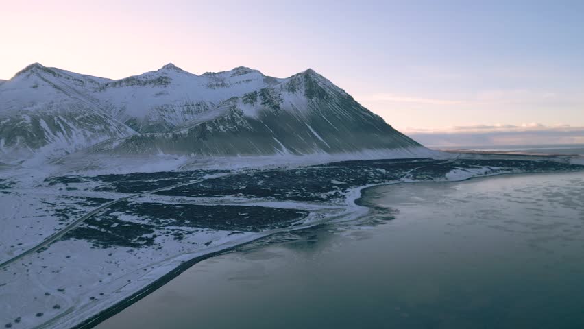 Winter in Iceland mountains road and ocean 4K