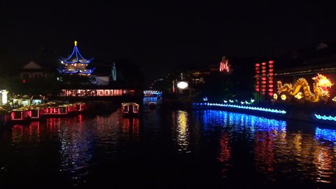 NANJING, CHINA - APRIL 30, 2012, Fast motion of Old town in Nanjing and Qinhuai River by night