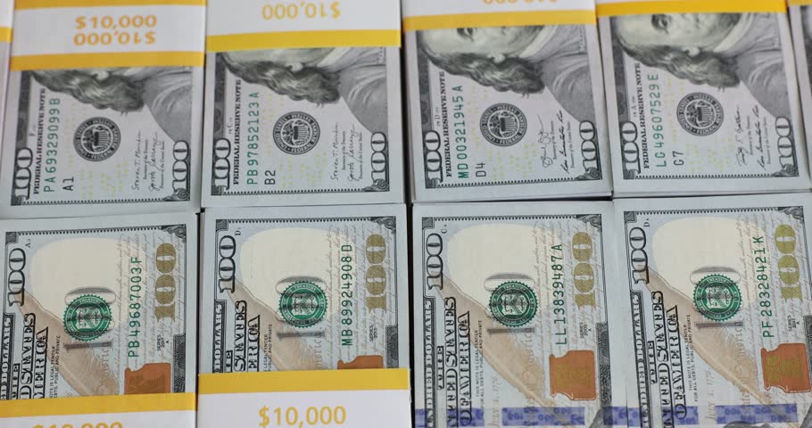 Model of an airplane flying over racks of hundred dollar bills. Airfare ...