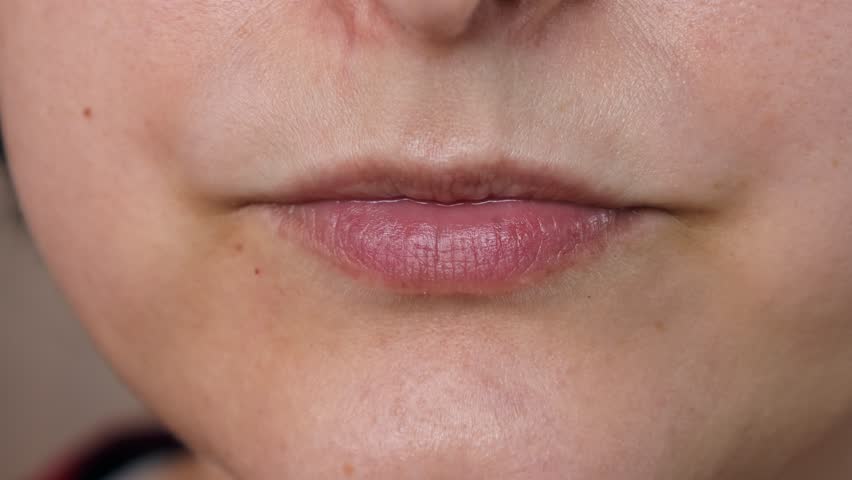 Woman eating Asian Onigiri (Japanese rice balls) close up