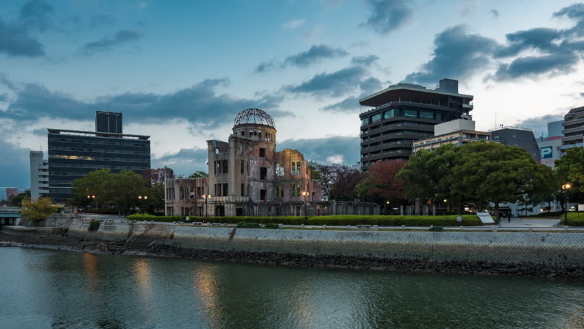 Hiroshima, Japan, timelapse view of sunrise over the Hiroshima Peace Memorial, aka Atomic Bomb Dome, the only structure left standing in the area where the first A-bomb exploded August 6, 1945.