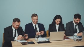 Group of business professionals in formal attire having a strategic discussion during a meeting. Concept of workplace collaboration and teamwork. - Powered by Shutterstock - Get 15% off with code: PIKWIZARD15