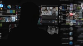 Anonymous Hooded Person Working on Computer. Dark Room With Devices Playing Several Internet Videos. Social Media, Program Code Interface Fingerprint Access. Artificial Intelligence, AR
 - Powered by Shutterstock - Get 15% off with code: PIKWIZARD15
