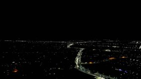 Night shots of the city taken from above, showing street lights and buildings creating a picturesque cityscape - Powered by Shutterstock - Get 15% off with code: PIKWIZARD15