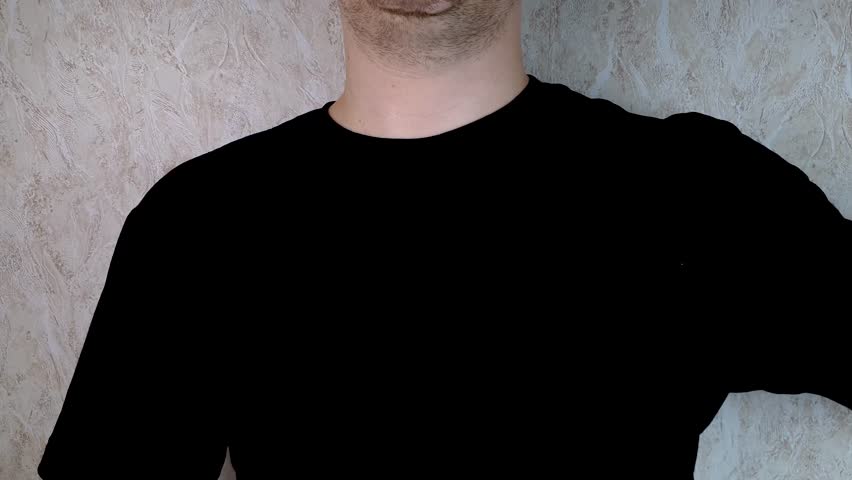 Man holding a ZIP bag with a white powdery drug in his hand. Drug dealer, distribution, sale of illegal substances.