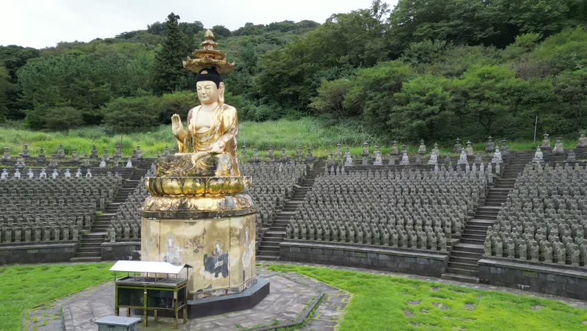 Gwaneumsa Temple, Buddha Statue in Jeju City, Jeju Island, South Korea. Aerial Drone View. RAW shooting - no filter.