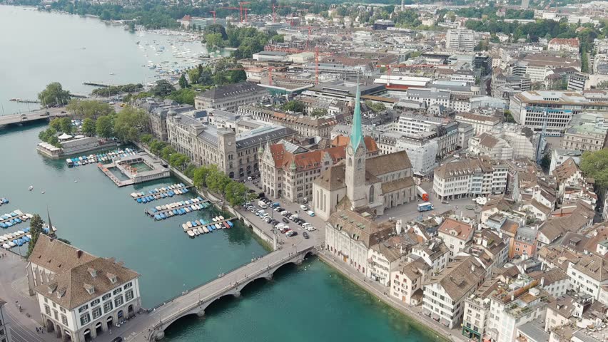 Dolly zoom. Zurich, Switzerland. Panorama of the city overlooking Lake Zurich. Summer day, Aerial View, Departure of the camera