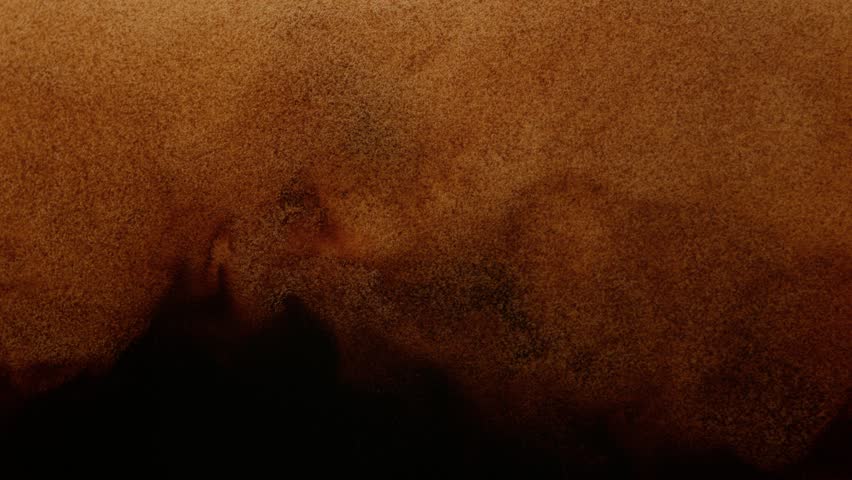 Super Slow Motion Detail Shot of Pouring Fresh Creamy Coffee at 1000fps.