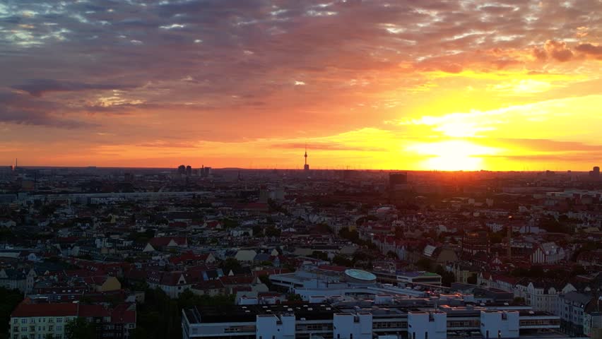 Berlin tv tower cloudy sun morning sunrise. Amazing aerial view flight drone