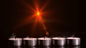Burning candles animation over extinguished tealight candles in dark background. flame, glow - Powered by Shutterstock - Get 15% off with code: PIKWIZARD15
