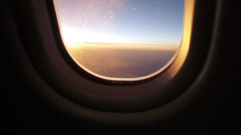 airplane window view at sunset sunrise 1080 HD passenger aircraft aviation airline flying traveling busyness