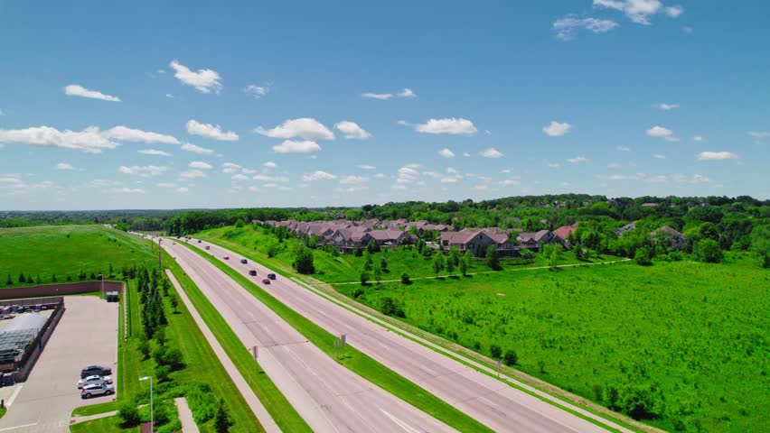Rising aerial of Tranquil Suburban Life Along Sussex, Wisconsin’s Scenic Highway