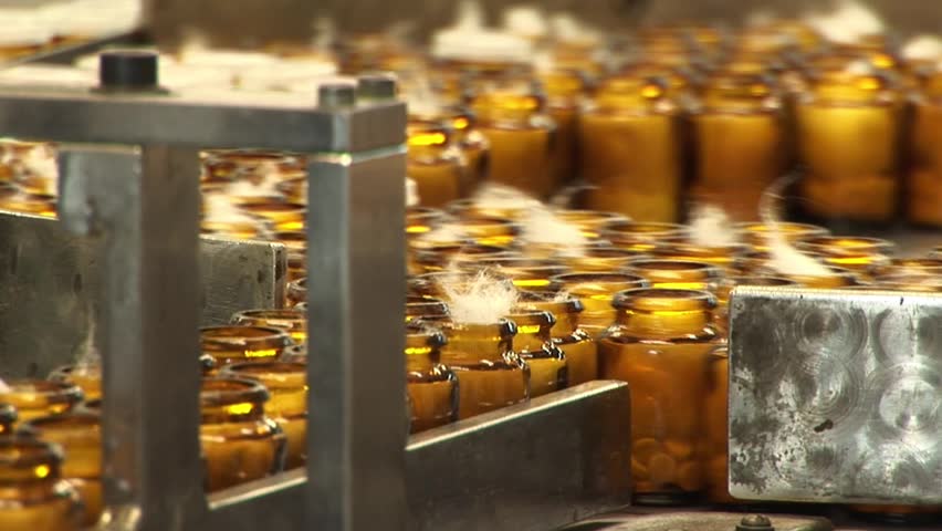 Automated production of medicines. Packaging of tablets in a glass container