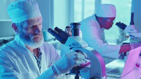 Chemists conduct experiments using advanced equipment to analyze chemical properties in a laboratory setting. - Powered by Shutterstock - Get 15% off with code: PIKWIZARD15