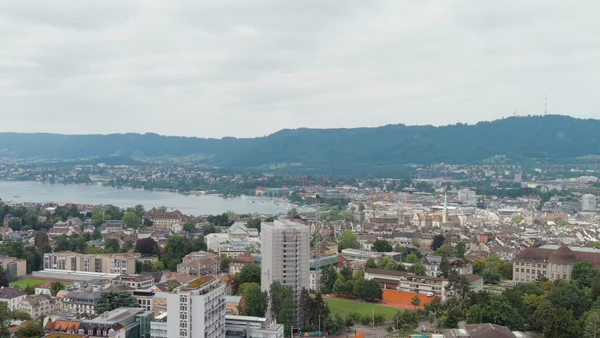 Dolly zoom. Zurich, Switzerland. Panorama of the city overlooking Lake Zurich. Summer day, Aerial View