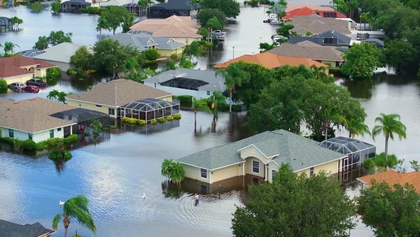 Flooded residential area with underwater houses from hurricane Debby rainfall water in Laurel Meadows community in Sarasota, Florida. Aftermath of natural disaster in southern USA