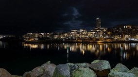 Full moon rising over the newly built residential island with many modern apartment building sin Aarhus Denmark - Powered by Shutterstock - Get 15% off with code: PIKWIZARD15