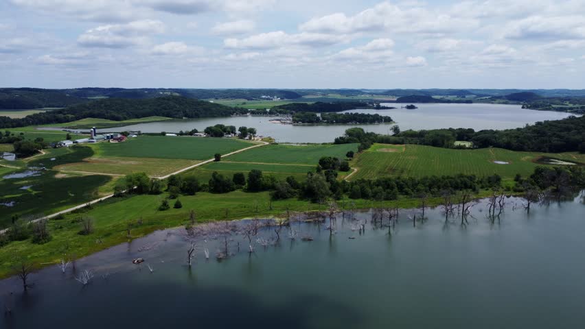 Dead Trees Submerged In A Permanently Flooded Lake In The Rural Farmlands Of Dane County, Wisconsin. Aerial Reverse Shot Over Fish Lake, Lussier County Park.