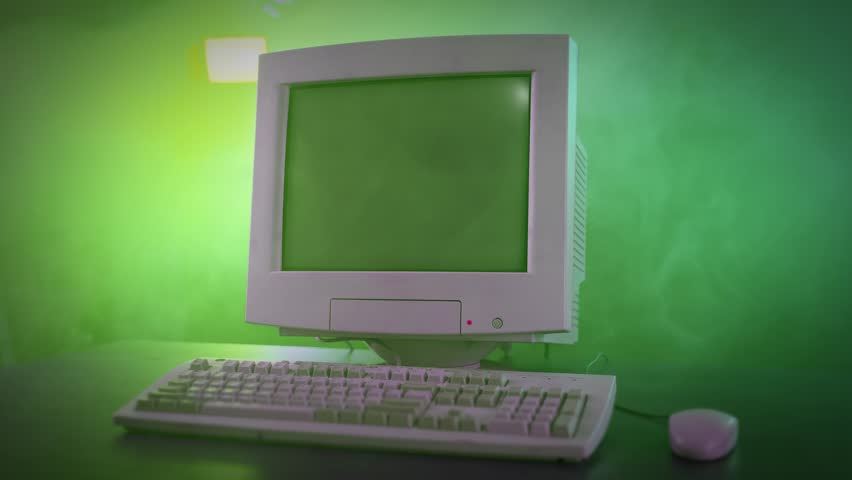 A dramatic three-quarter right side view of mysterious computer code on a retro CRT monitor. Hacker concept. Code is fictional and nonsense.  	
