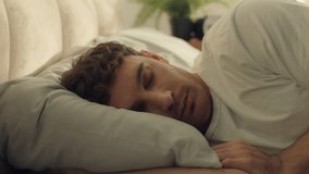 Caucasian European man face wake up good morning male guy relaxation smile bed bedroom home comfortable cozy weekend sleeping wellbeing refreshment tranquility rest duvet dreaming awake nap pleasure - Powered by Shutterstock - Get 15% off with code: PIKWIZARD15