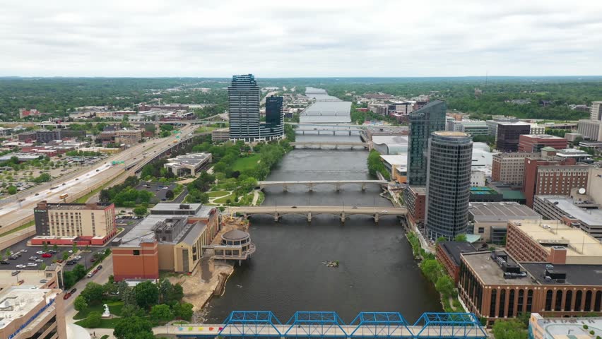 Beautiful 4K Drone video of the Grand River running through downtown Grand Rapids, MI on a summer day