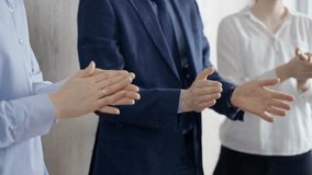 Diverse business team clapping hands in a modern office. Business people applauding with close up of hands - Powered by Shutterstock - Get 15% off with code: PIKWIZARD15