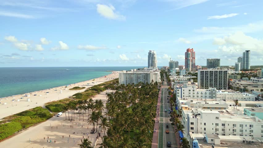 Miami Beach, South Beach. Miami Beach skyline. Miami cityscape, aerial view. Top view of Miami coastline, shore, landscape, skyscrapers near ocean. Luxury travel in USA. Ocean turquoise beach.