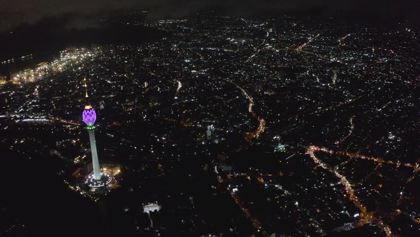 Low light drone footage, Night time aerial view of the Colombo city, Sri Lanka, Lotus Tower, breathtaking view, Tourism