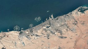 Dubai city grow process. United arab emirates satellite images time lapse. UAE town growth, years of development aerial view. Modern change concept. Geography map. Emergence of urban environment. - Powered by Shutterstock - Get 15% off with code: PIKWIZARD15
